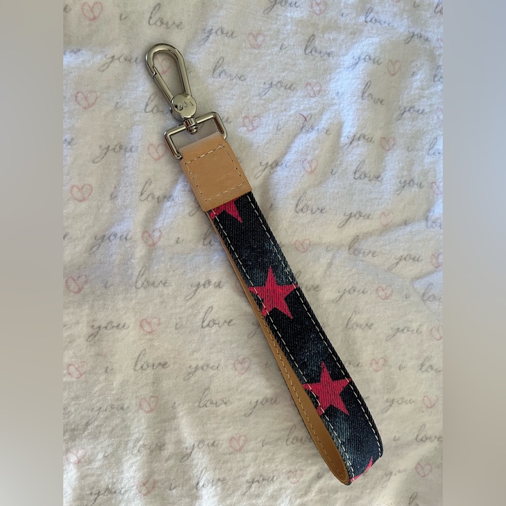 Consuela wristlet brand new with no tag in pristine condition